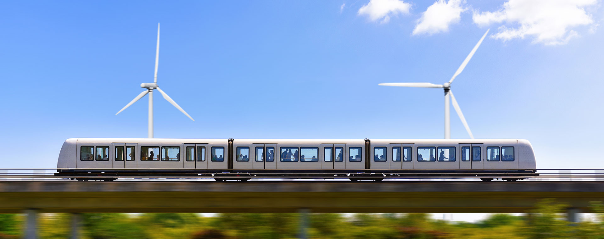 Moving train with wind turbines in the back
