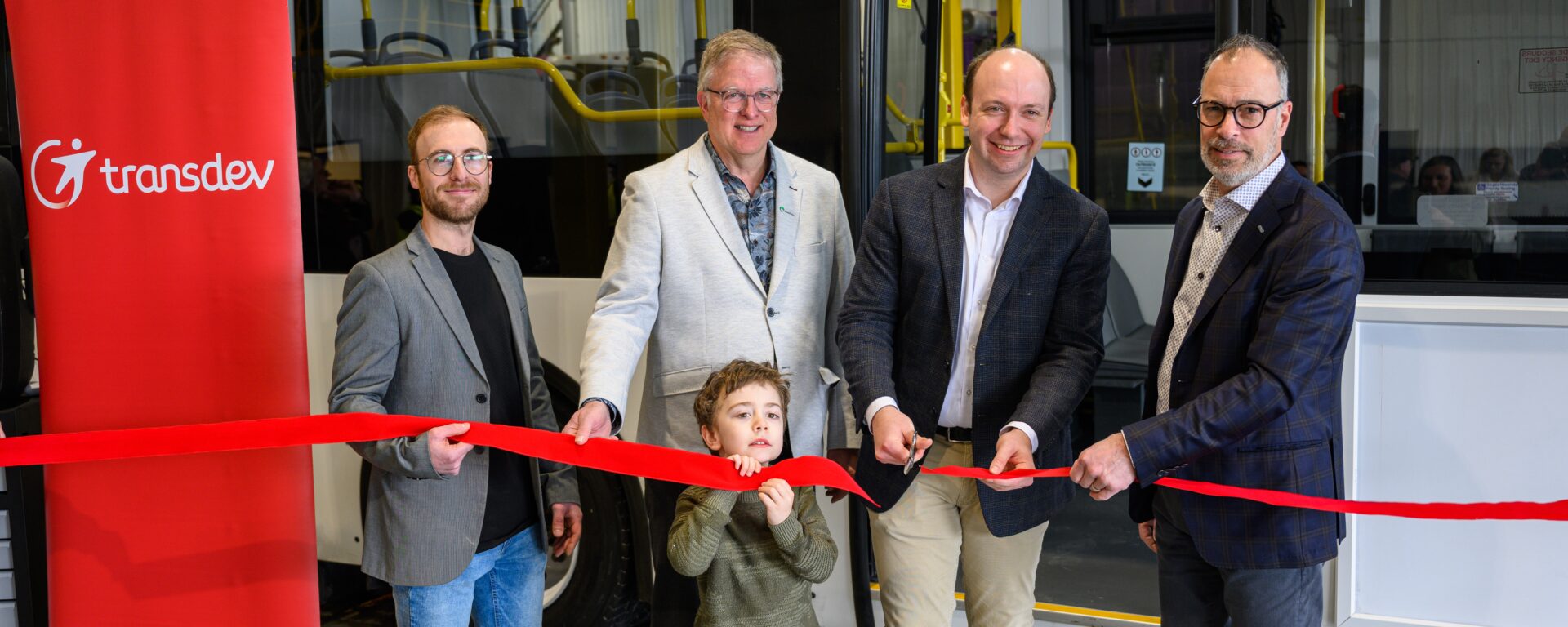 Inauguration facility in Beloeil, Canada with people cutting a ribbon